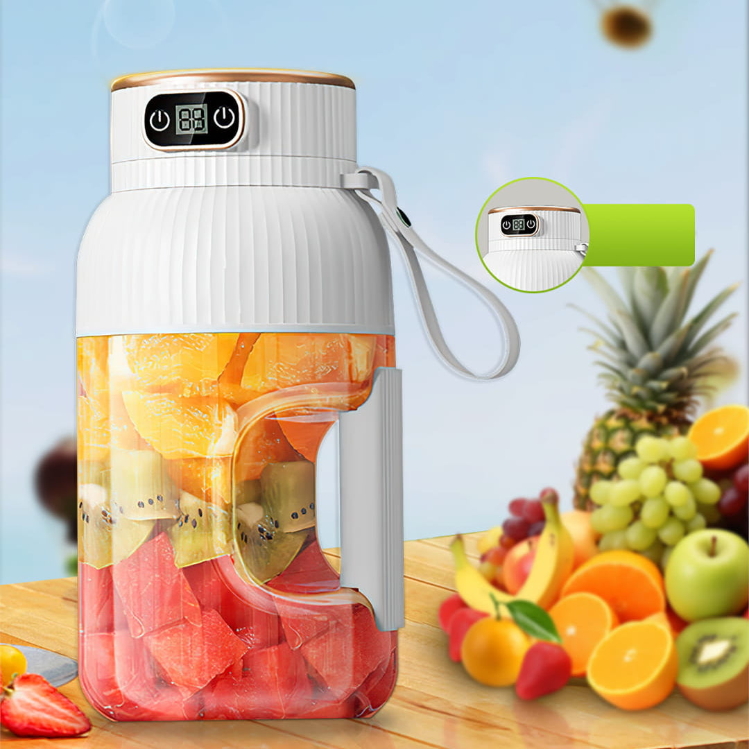 Juicer with fruits in the background on a wooden surface